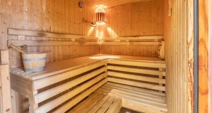 Ferienwohnung 'Ruhiges Nest Mit Sauna Und Garten' mit Gemeinschaftsgarten und WLAN