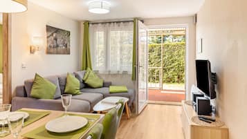 Télévision, table de tennis de table, chaßne hi-fi