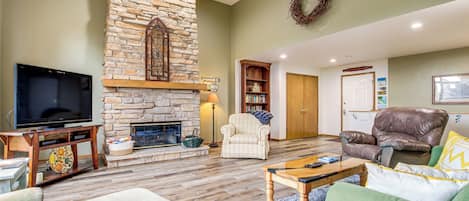 TV, fireplace, books
