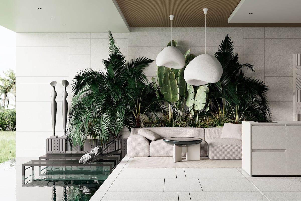A modern living room with a sofa, coffee table, and decorative lamps.