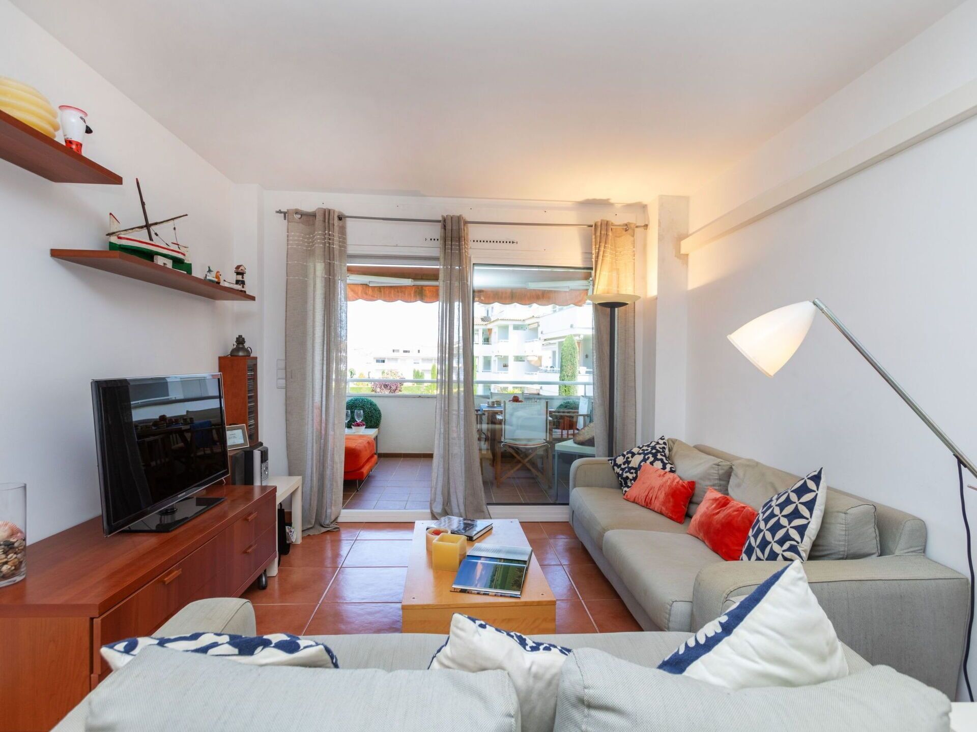 Property, Furniture, Table, Couch, Azure, Comfort, Cabinetry, Building, Picture Frame, Orange