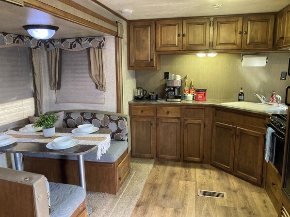 Fridge, microwave, stovetop, coffee/tea maker