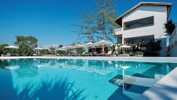 Outdoor pool, open 9:00 AM to 9:00 PM, pool umbrellas, sun loungers