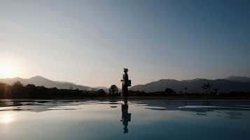 Outdoor pool, open 9:00 AM to 9:00 PM, pool umbrellas, sun loungers