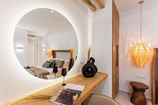 Premium bedding, desk, laptop workspace, soundproofing