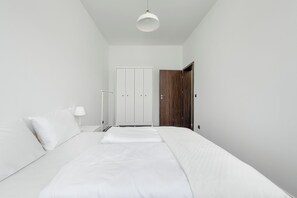 Apartment, 1 Bedroom, Balcony | 1 bedroom, laptop workspace, iron/ironing board, bed sheets - Wrocław Krzyki Apartment by Renters (Wroclaw)