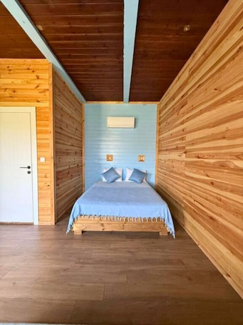 Family Bungalow, Garden View | Bathroom | Shower, hair dryer, towels, soap