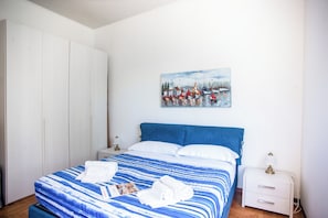 Apartemen Keluarga, beberapa kamar (Spazioso App.To Mare E Sport) | 2 kamar tidur, setrika/meja setrika, dan seprai linen