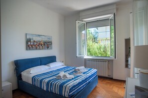 Apartamento familiar, varias habitaciones (Spazioso App.To Mare E Sport) | 2 dormitorios, tabla de planchar con plancha, ropa de cama