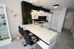 Fridge, microwave, oven, dishwasher