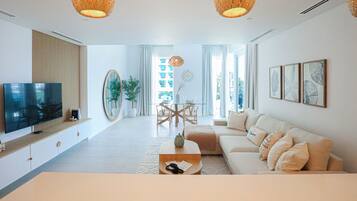 Exclusive Apartment | Living area | 55-inch Smart TV with cable channels