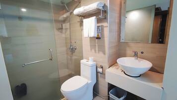 Shower, rainfall showerhead, hair dryer, towels