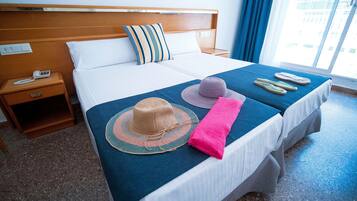 Escritorio, wifi gratis, ropa de cama