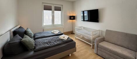 2 bedrooms, desk, iron/ironing board, travel crib