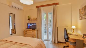 1 bedroom, desk, iron/ironing board, travel cot