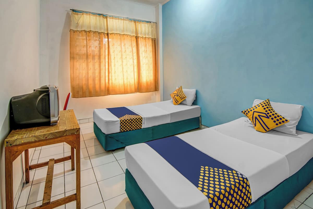 Kamar Twin Basic | Wi-Fi gratis dan seprai linen