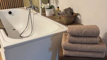 Hair dryer, towels, soap, toilet paper