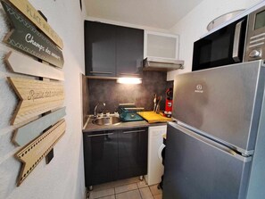 Fridge, microwave, coffee/tea maker, high chair