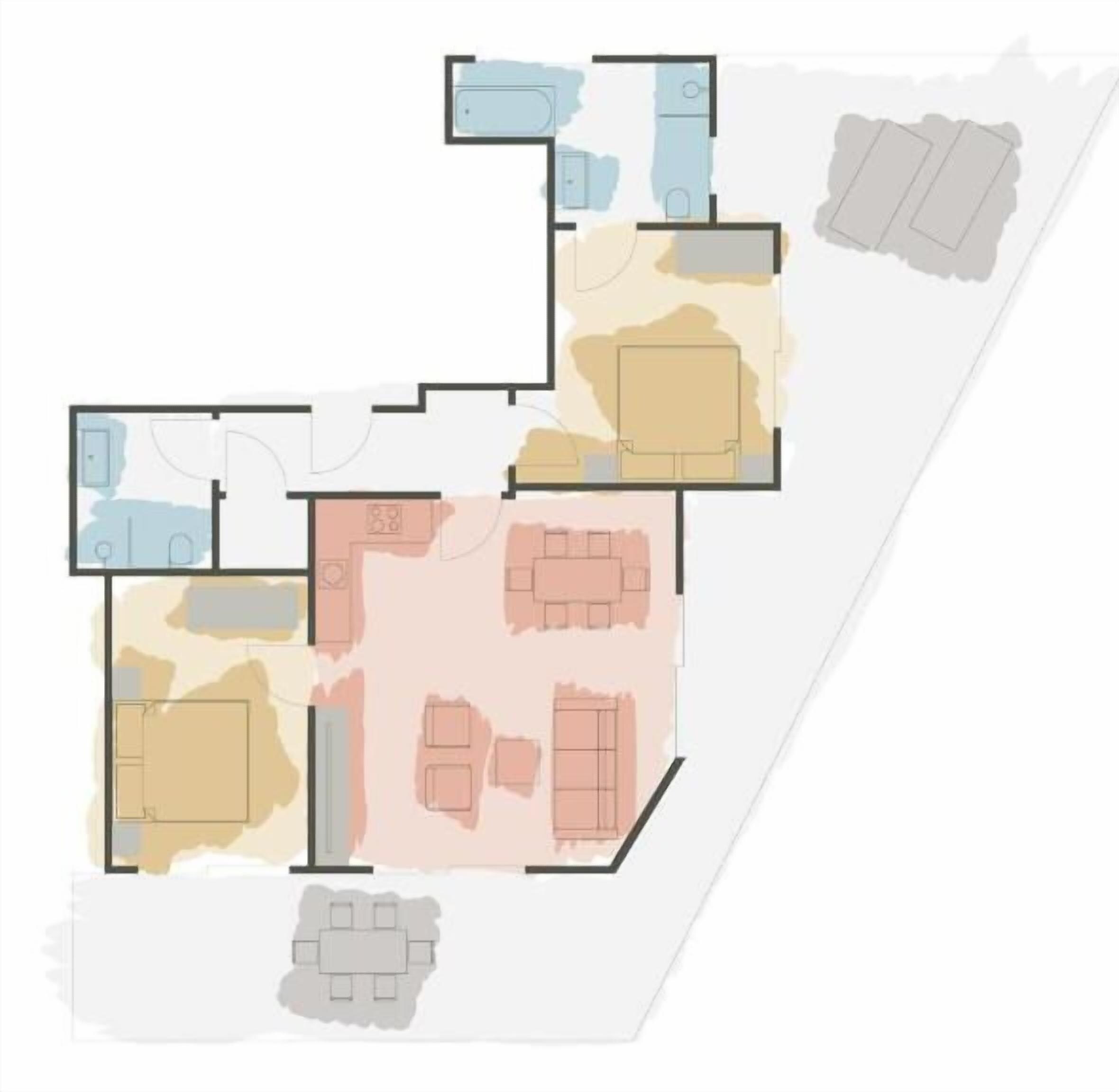 Un plan d’étage comprenant un salon, un coin repas, une cuisine et deux chambres.
