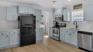 House, Multiple Beds, Patio, Garden View (Slice of Paradise) | Private kitchen | Coffee/tea maker, dining tables