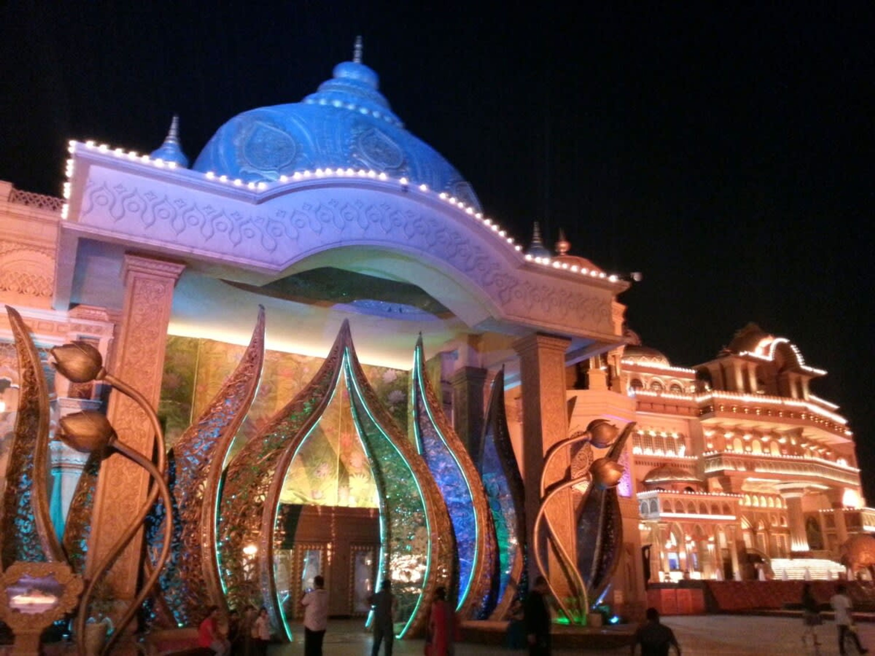 A large, ornate building with a prominent dome and intricate architectural details.