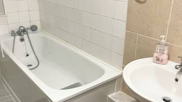 Hair dryer, towels, soap, toilet paper