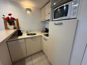 Fridge, microwave, coffee/tea maker, electric kettle