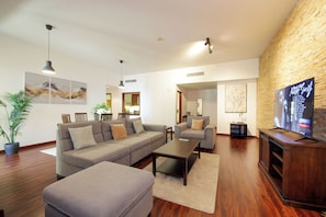 Apartment, Partial Sea View | Living area | 42-inch LED TV with digital channels, streaming services