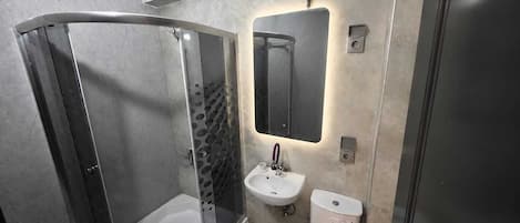 Hair dryer, towels, toilet paper