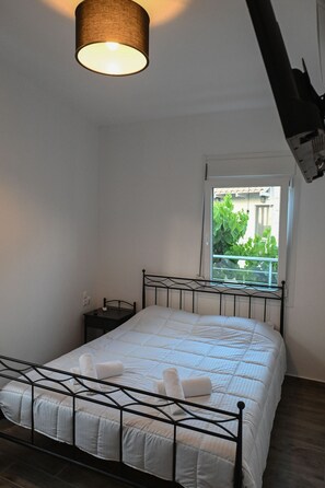 2 dormitorios, tabla de planchar con plancha, wifi y ropa de cama