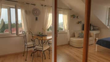 Apartment (One Bedroom Apartment with Sea View) | Living room | 32-inch flat-screen TV with digital channels