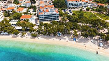 On the beach, white sand