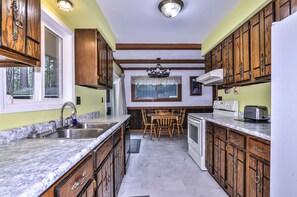 Fridge, microwave, oven, stovetop - Stepaway Vacation Rentals- Conifer Cabin (St.Germain)