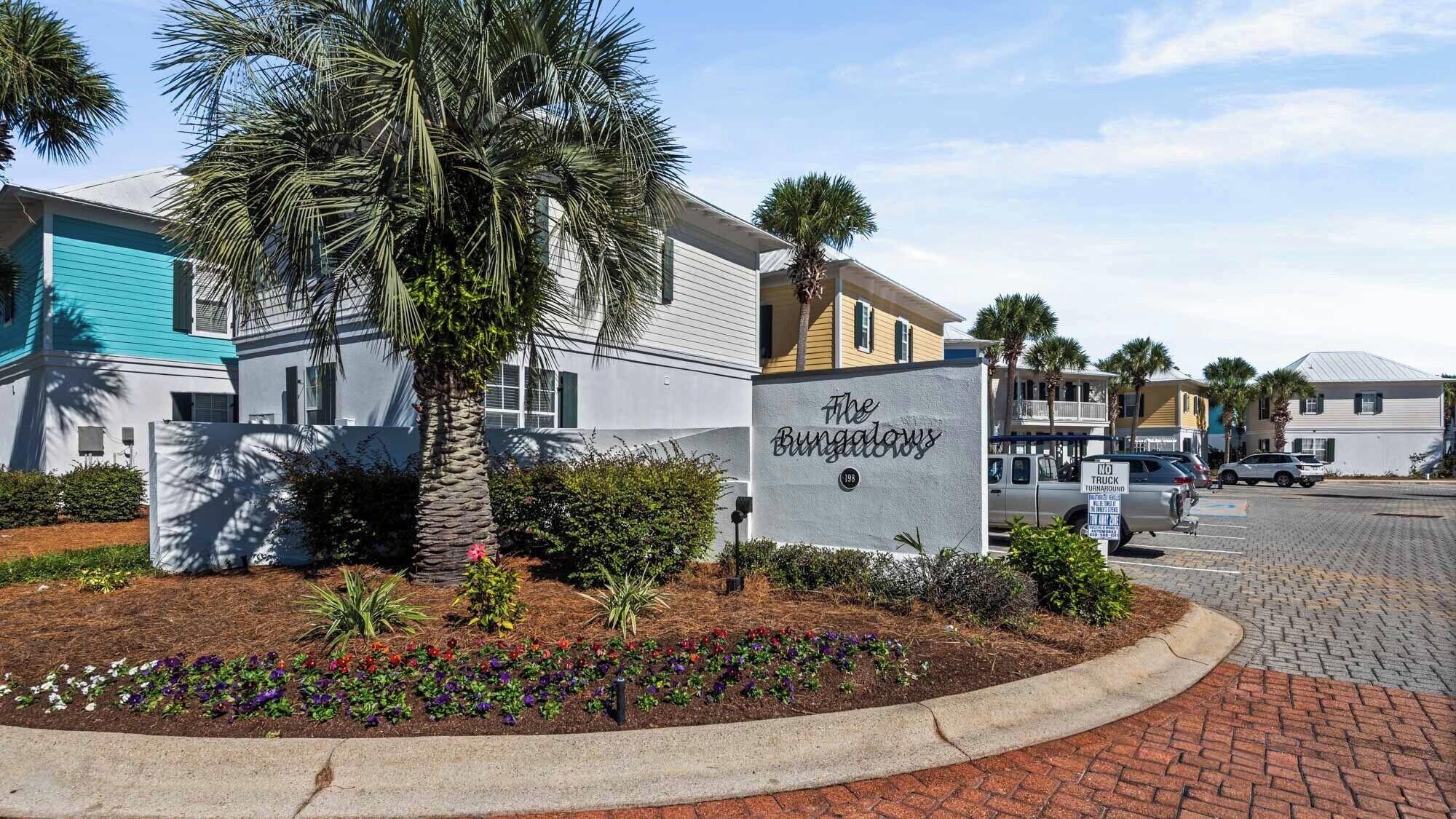 A row of modern, two-story buildings with a sign reading "The Bungalow."