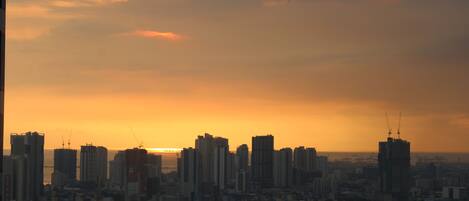 Panoramic Condo, 1 Bedroom, Balcony, Partial Ocean View | 1 bedroom, hypo-allergenic bedding, individually furnished, desk