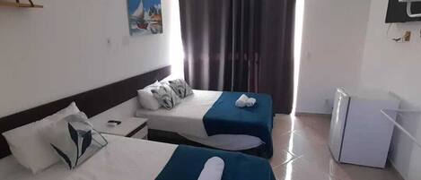 Minibar, wifi gratis y ropa de cama