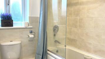 Hair dryer, towels, soap, toilet paper