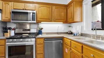 Townhome, Multiple Beds, Patio, Garden View (Beachwalk 10B) | Private kitchen | Fridge, microwave, oven, stovetop