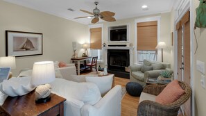 House, Multiple Beds, Patio, Garden View (Quietude) | Living area | 42-inch flat-screen TV with digital channels, fireplace - Dog-friendly Gulf Side Cottage & 6 Minutes to Beach + Community Pool & Bikes (Santa Rosa Beach)