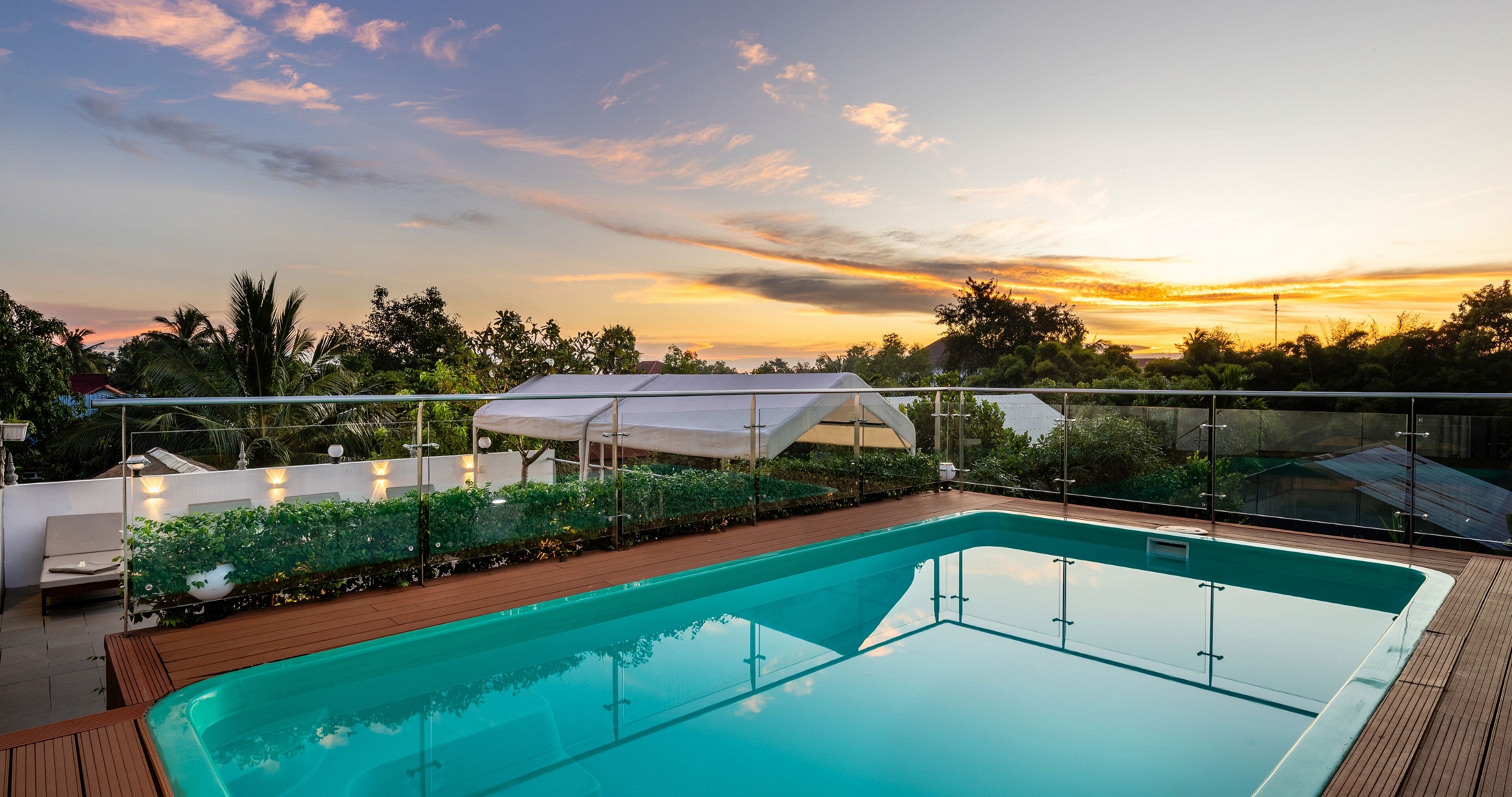 Outdoor pool, open 6:30 AM to 9:00 AM, pool umbrellas, sun loungers