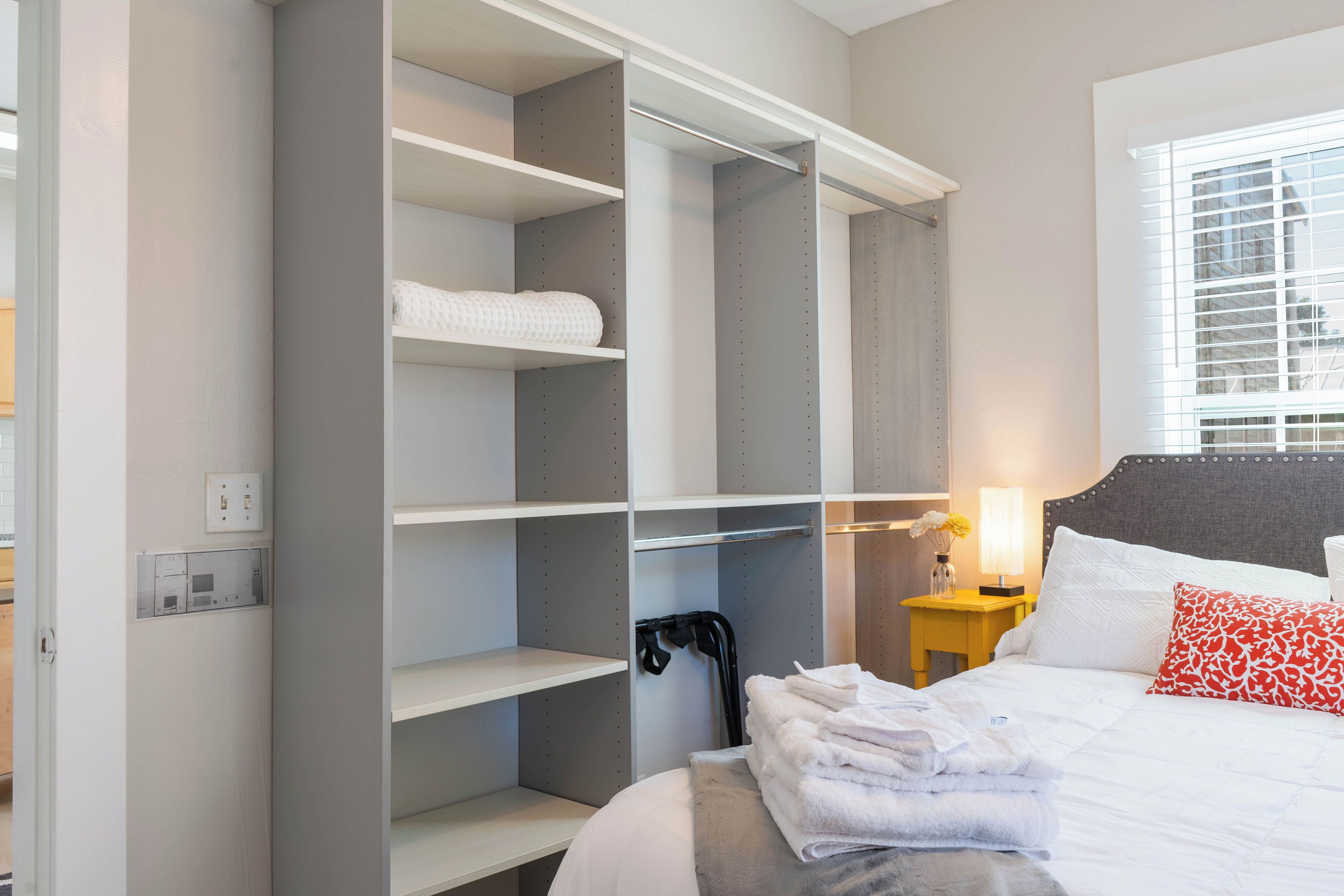 1 bedroom, desk, iron/ironing board, travel crib