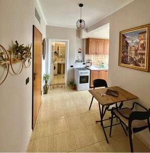 Enjoy meals in this well-equipped kitchen with a central island and dining area.
