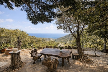 Outdoor dining. Ikaria Roots Resort & VIlla Private Blue Zone Longevity Retreat with Pool
