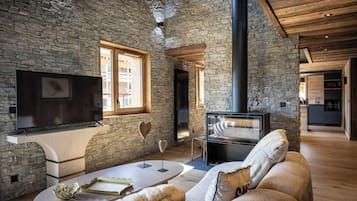 Exclusive Apartment, 5 Bedrooms | Living area | Flat-screen TV