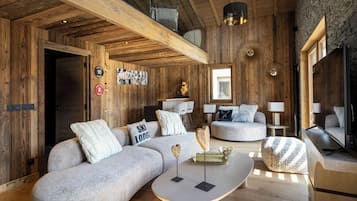 Exclusive Apartment, 5 Bedrooms | Living area | Flat-screen TV