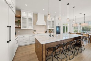 Fridge, microwave, oven, stovetop - Brand New Luxury Home with Pool and Rooftop Deck: Just Pearly (Bradenton Beach)