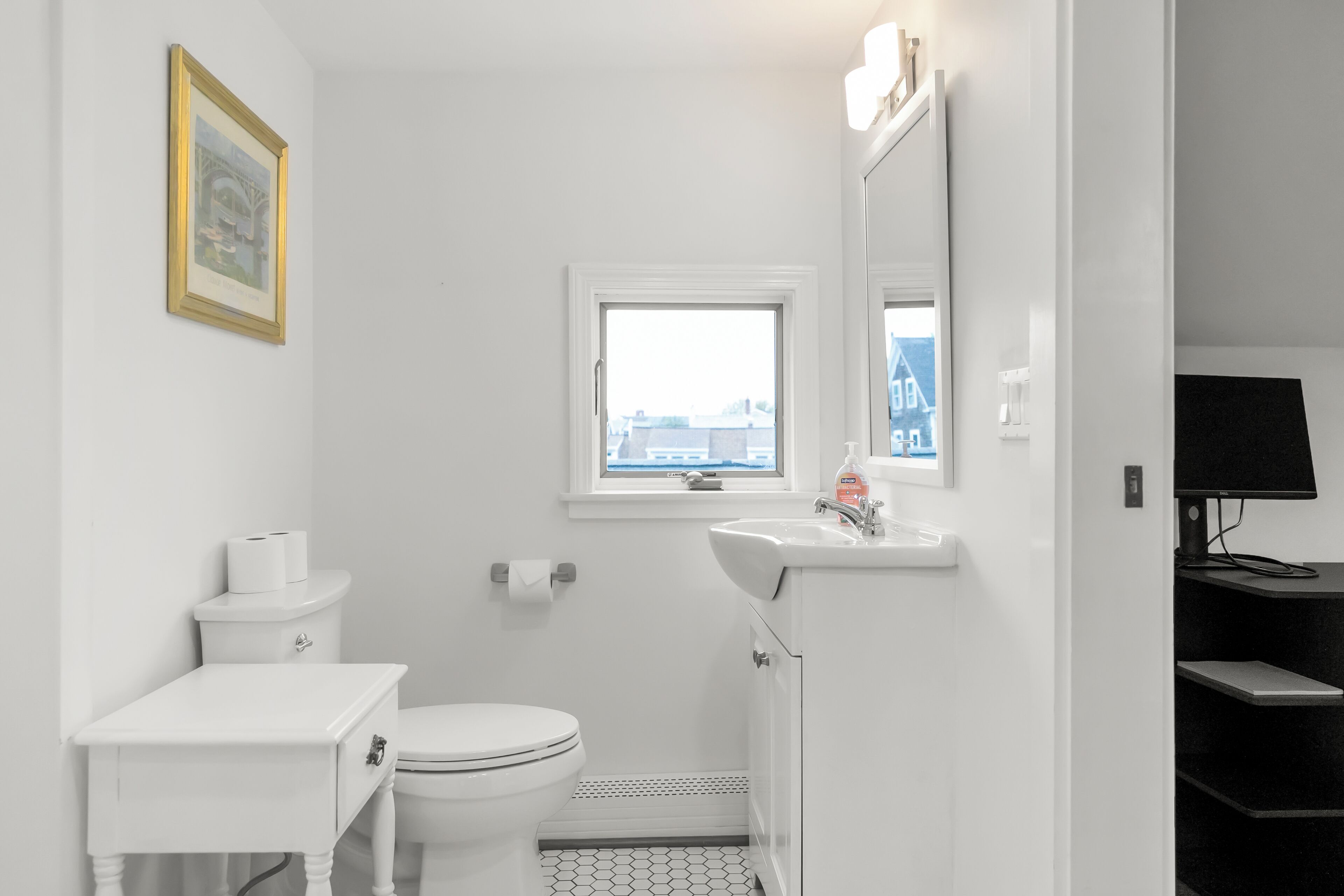 Conveniently located adjacent to the bedrooms upstairs. Elegance and Comfort!