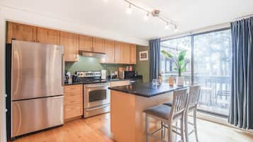 Fridge, microwave, stovetop, coffee/tea maker