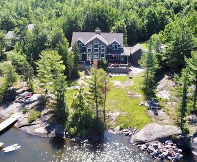 Spectacular Waterfront Escape: Experience Timber Frame Tranquility