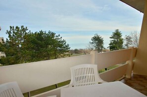 Outdoor dining - Holiday apartment with air conditioning and balcony (Bibione)
